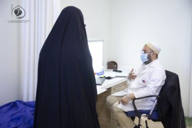 Dr. Adeeb Giving advice to patient